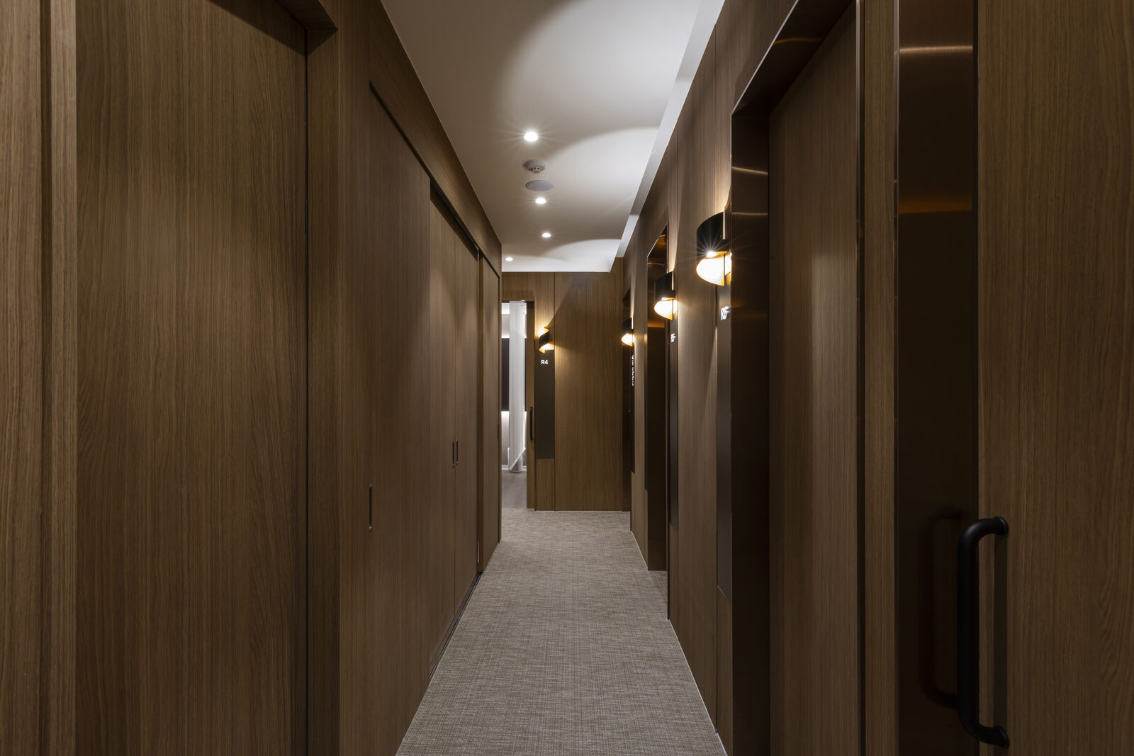 The corridor between private treatment rooms at Symphony Dermatology in Seoul